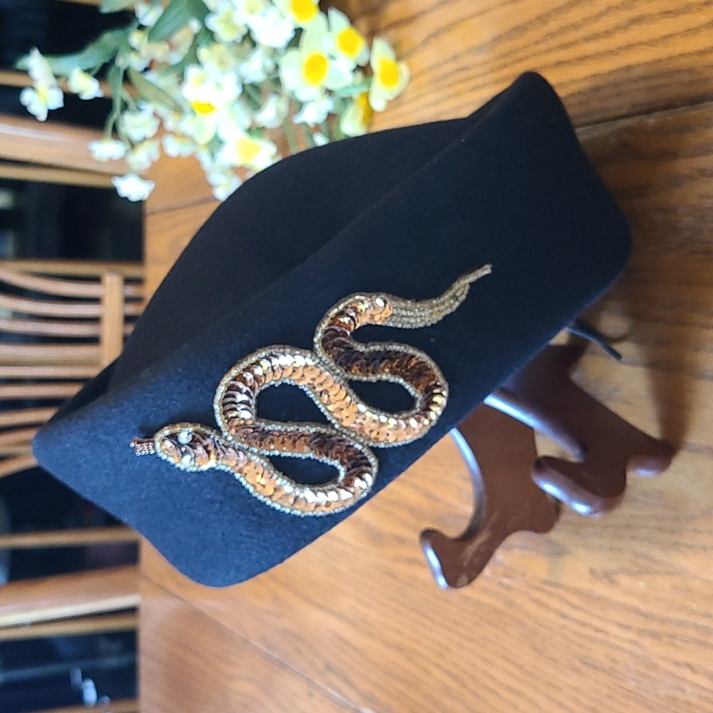 Elegant Black Hat with Gold Snake Embellishment